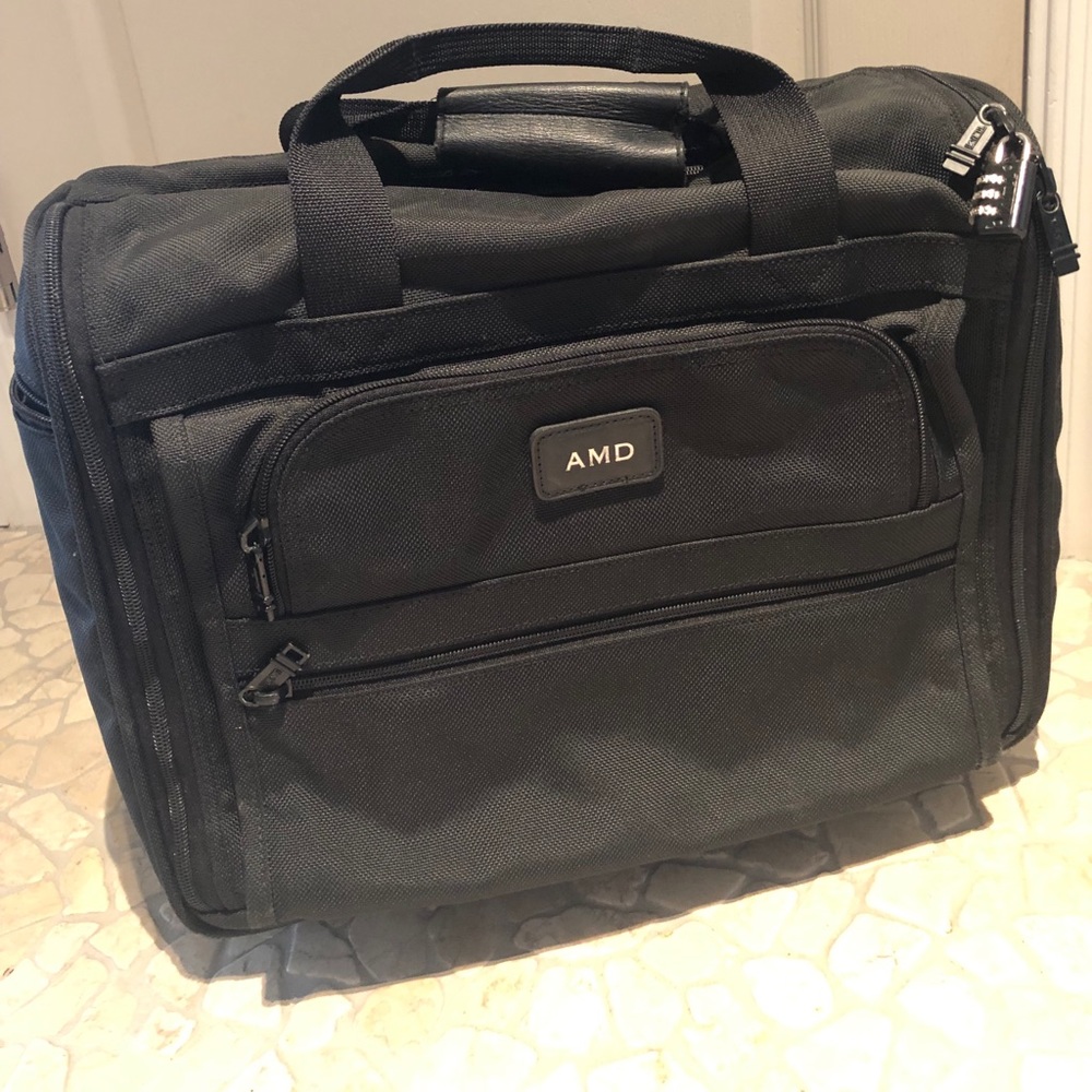 Tumi rolling briefcase! Good condition !